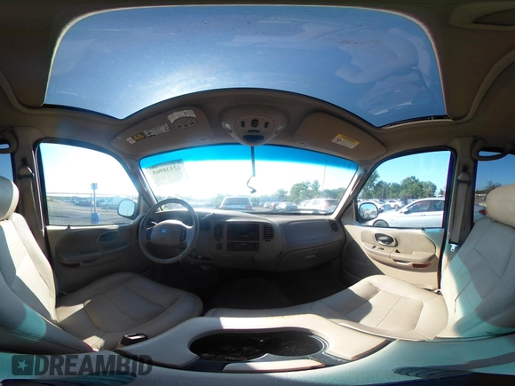 2003 Ford F-150 XLT with VIN 1FTRW08L63KC51053, listed as a IAAI auction lot 42538965 with 167,383 mi miles and . Bid and sale history available at DreamBid. Image 18.