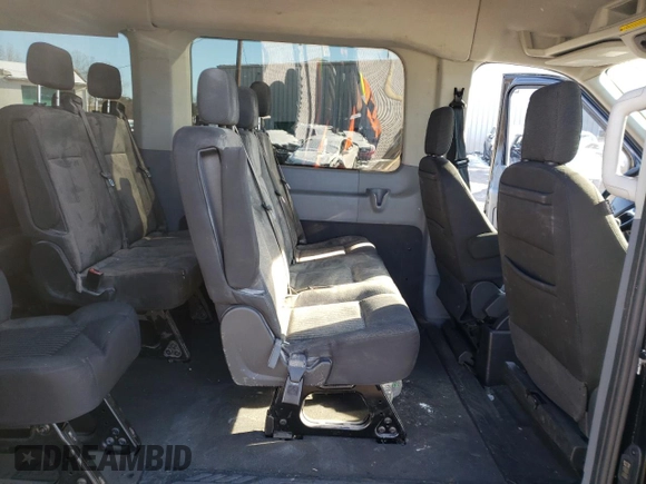 2018 Ford Transit XL z VIN 1FBVU4XGXJKA27026, wystawiony jako Copart lot #85449514 z przebiegiem 142 942 mil mil oraz Szkoda całkowita • Salvage title. Historia ofert i sprzedaży dostępna na DreamBid. Obrazek 11.