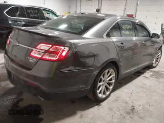 2015 Ford Taurus Limited with VIN 1FAHP2J86FG106828, listed as a IAAI auction lot 41748997 with 221,216 mi miles. Bid and sale history available at carsss.com. Image 4.