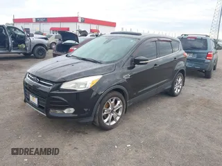 2013 Ford Escape SEL with VIN 1FMCU0HX5DUD64279, listed as a IAAI auction lot 42105721 with 178,271 mi miles. Bid and sale history available at carsss.com. Image 2.
