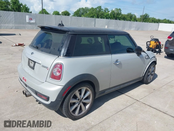 2013 MINI Hardtop S with VIN WMWSV3C54DT476756, listed as a IAAI auction lot 42691529 with 130,877 mi miles and . Bid and sale history available at DreamBid. Image 4.