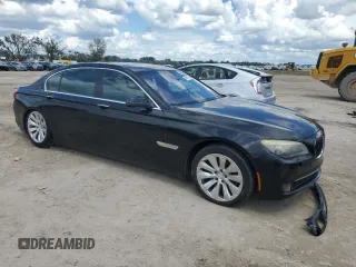 2011 BMW 7 Series with VIN WBAKX8C57BC198326, listed as a Copart auction lot 69985174 with 142,353 mi miles and Clean title. Bid and sale history available at DreamBid. Image 4.