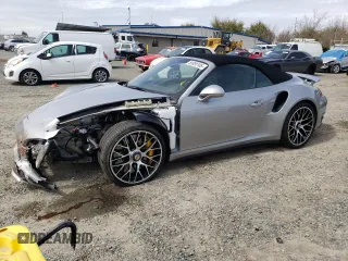 2014 Porsche 911 Turbo with VIN WP0CD2A91ES173337, listed as a Copart auction lot 50095105 with 22,437 mi miles and Salvage Title. Bid and sale history available at carsss.com. Image 1.