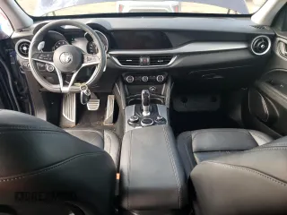 2018 Alfa Romeo Stelvio Sport z VIN ZASFAKPN8J7B69591, wystawiony jako Copart lot #54693475 z przebiegiem 98 148 mil mil oraz Szkody całkowita. Historia ofert i sprzedaży dostępna na DreamBid. Obrazek 8.