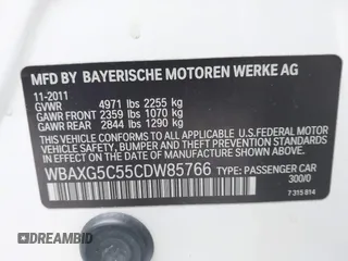 2012 BMW 5 Series 528i with VIN WBAXG5C55CDW85766, listed as a IAAI auction lot 41373727 with 105,056 mi miles. Bid and sale history available at carsss.com. Image 9.