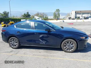 2024 Mazda 3 S with VIN 3MZBPAAMXRM421243, listed as a IAAI auction lot 41997588 with 10,099 mi miles and . Bid and sale history available at DreamBid. Image 13.