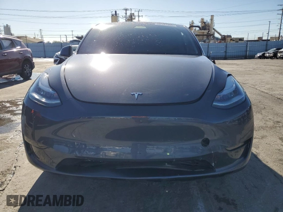 2023 Tesla Model Y Long Range with VIN 7SAYGDEE2PA047794, listed as a Copart auction lot 48397305 with 18,850 mi miles and Salvage Title. Bid and sale history available at DreamBid. Image 5.