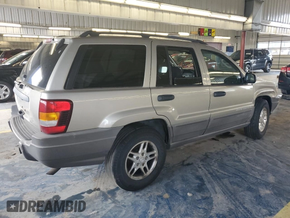 2003 Jeep Grand Cherokee Laredo with VIN 1J4GW48S43C567559, listed as a Copart auction lot 61431595 with 249,998 mi miles and Salvage title. Bid and sale history available at DreamBid. Image 3.