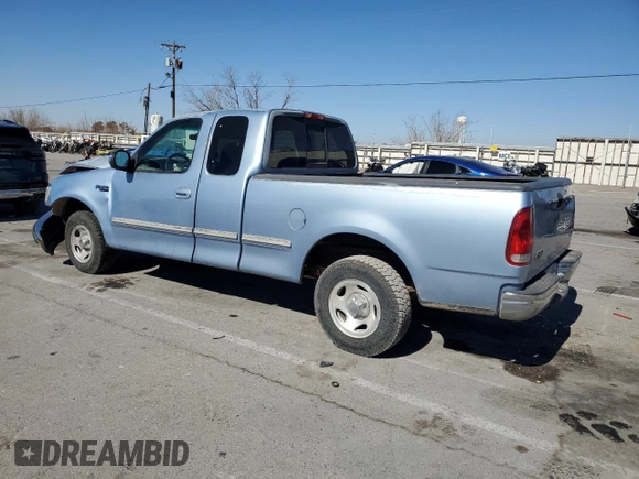 1998 Ford F-150 with VIN 1FTDX1725WKA02303, listed as a Copart auction lot 43471005 with 89,812 mi miles and Salvage title. Bid and sale history available at DreamBid. Image 2.