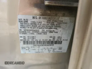 2008 Mercury Sable с VIN 1MEHM40WX8G603039, выставлен на аукционе Copart как лот 70368604 с пробегом 196 179 миль миль и Списание • Salvage title. История ставок и продаж доступна на DreamBid. Изображение 12.