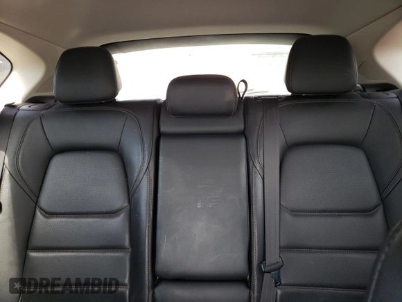 2020 Mazda CX-5 Grand Touring with VIN JM3KFBDM0L0767634, listed as a Copart auction lot 54433935 with 57,901 mi miles and Salvage Title. Bid and sale history available at carsss.com. Image 10.