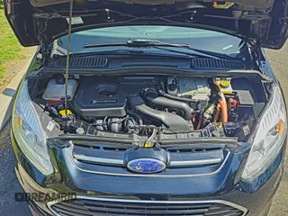 2018 Ford C-Max SE z VIN 1FADP5AU4JL102628, wystawiony jako Copart lot #59427625 z przebiegiem 55 666 mil mil oraz Szkody całkowita. Historia ofert i sprzedaży dostępna na DreamBid. Obrazek 7.