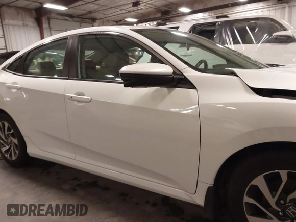 2018 Honda Civic EX with VIN 19XFC2F74JE005647, listed as a IAAI auction lot 41938607 with 90,263 mi miles and . Bid and sale history available at DreamBid. Image 14.