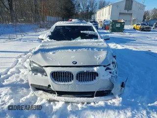 2014 BMW 7 Series 740Li xDrive with VIN WBAYF4C57ED282182, listed as a IAAI auction lot 41324877 with 102,699 mi miles. Bid and sale history available at carsss.com. Image 12.
