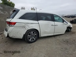 2014 Honda Odyssey Touring z VIN 5FNRL5H91EB089813, wystawiony jako Copart lot #58674275 z przebiegiem Nie podano mil oraz Szkoda całkowita • Salvage title. Historia ofert i sprzedaży dostępna na DreamBid. Obrazek 3.