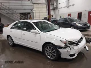 2005 Toyota Camry LE with VIN 4T1BF30KX5U083054, listed as a IAAI auction lot 41814022 with 195,608 mi miles and . Bid and sale history available at DreamBid. Image 1.