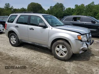 2010 Ford Escape XLS with VIN 1FMCU0C70AKB52226, listed as a Copart auction lot 58241455 with 237,785 mi miles and Salvage title. Bid and sale history available at DreamBid. Image 4.