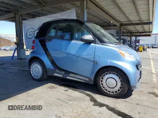2014 Smart fortwo Pure with VIN WMEEJ3BA6EK783848, listed as a Copart auction lot 58244595 with 26,131 mi miles and Clean title. Bid and sale history available at DreamBid. Image 4.