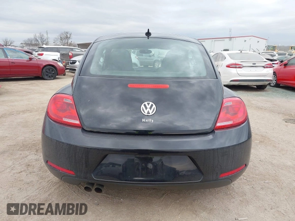 2013 Volkswagen Beetle 2.5L with VIN 3VWJP7AT8DM679548, listed as a IAAI auction lot 41459613 with 135,198 mi miles and . Bid and sale history available at DreamBid. Image 16.