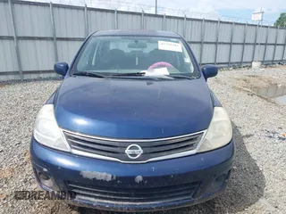 2011 Nissan Versa S with VIN 3N1BC1AP2BL408977, listed as a IAAI auction lot 42524102 with 195,285 mi miles and . Bid and sale history available at DreamBid. Image 12.