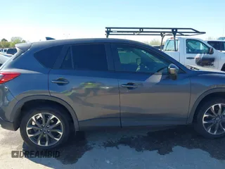 2016 Mazda CX-5 Grand Touring with VIN JM3KE2DYXG0784615, listed as a IAAI auction lot 41846853 with 72,185 mi miles. Bid and sale history available at carsss.com. Image 13.