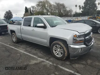 2017 Chevrolet Silverado 1500 LT with VIN 1GCPCREC7HF142769, listed as a Copart auction lot 45243175 with 188,038 mi miles and Salvage Title. Bid and sale history available at DreamBid. Image 4.