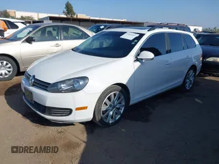 2013 Volkswagen Jetta SportWagen TDI w/Sunroof & Nav with VIN 3VWPL7AJ2DM632598, listed as a IAAI auction lot 42043462 with 99,922 mi miles. Bid and sale history available at carsss.com. Image 2.
