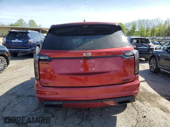 2024 Cadillac XT6 AWD Sport with VIN 1GYKPHRS4RZ715079, listed as a Copart auction lot 55297235 with 18,283 mi miles and Salvage title. Bid and sale history available at DreamBid. Image 6.