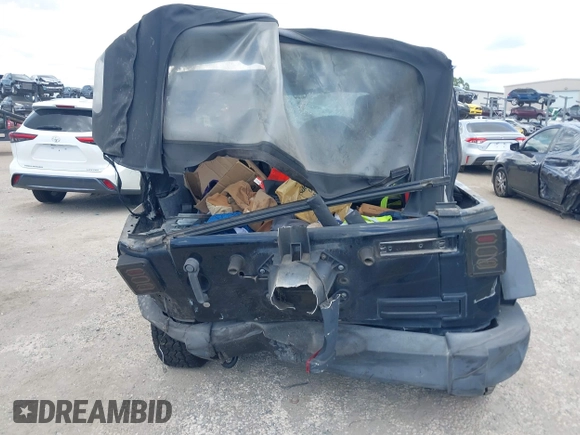 2015 Jeep Wrangler Freedom Edition with VIN 1C4AJWAG4FL681688, listed as a IAAI auction lot 42488018 with Not provided miles and . Bid and sale history available at DreamBid. Image 16.