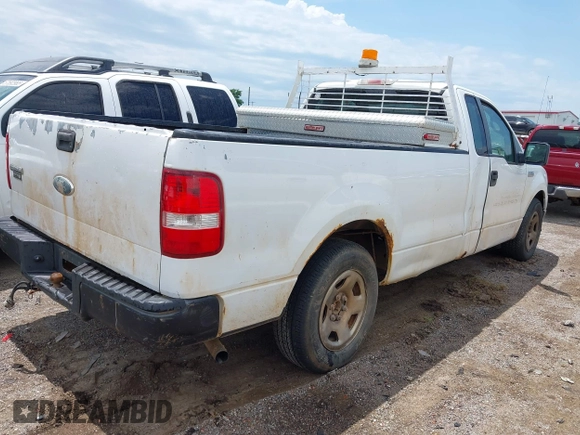 2007 Ford F-150 XL with VIN 1FTRF12217KB32628, listed as a IAAI auction lot 42328856 with 421,422 mi miles and . Bid and sale history available at DreamBid. Image 4.