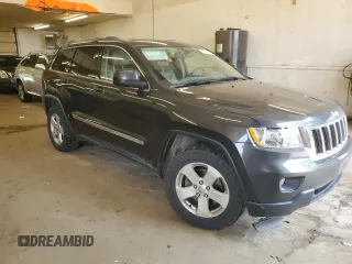 2011 Jeep Grand Cherokee Laredo with VIN 1J4RR4GG6BC641138, listed as a Copart auction lot 60209955 with 218,235 mi miles and Clean title. Bid and sale history available at DreamBid. Image 4.