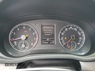 2014 Volkswagen Passat SE z VIN 1VWBT7A34EC077166, wystawiony jako Copart lot #57835415 z przebiegiem 121 814 mil mil oraz Szkoda całkowita • Salvage title. Historia ofert i sprzedaży dostępna na DreamBid. Obrazek 9.