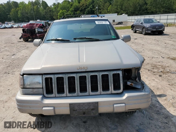 1998 Jeep Grand Cherokee Limited with VIN 1J4GZ78Y5WC324828, listed as a Copart auction lot 58992125 with 225,705 mi miles and Salvage title. Bid and sale history available at DreamBid. Image 5.