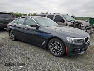 2018 BMW 5 Series 530i xDrive with VIN WBAJA7C5XJWC76816, listed as a Copart auction lot 52734405 with 77,917 mi miles and Clean Title. Bid and sale history available at carsss.com. Image 4.