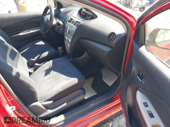 2007 Toyota Yaris with VIN JTDBT923171130563, listed as a IAAI auction lot 38763237 with 180,320 mi miles. Bid and sale history available at carsss.com. Image 5.