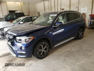 2018 BMW X1 xDrive28i with VIN WBXHT3C30J3H33429, listed as a Copart auction lot 49220033 with 28,916 mi miles. Bid and sale history available at carsss.com. Image 1.