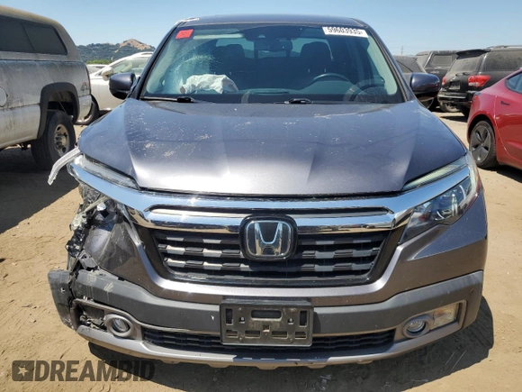2020 Honda Ridgeline RTL-E with VIN 5FPYK3F76LB010841, listed as a Copart auction lot 59603935 with 53,055 mi miles and Salvage title. Bid and sale history available at DreamBid. Image 5.