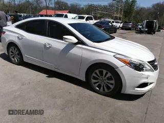 2014 Hyundai Azera with VIN KMHFG4JG8EA346609, listed as a IAAI auction lot 42010249 with 105,646 mi miles and . Bid and sale history available at carsss.com. Image 1.