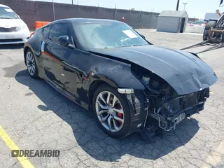 2015 Nissan 370Z Sport with VIN JN1AZ4EH3FM441836, listed as a IAAI auction lot 42094959 with 59,004 mi miles and . Bid and sale history available at DreamBid. Image 1.