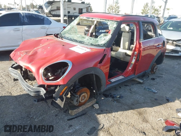 2014 MINI Countryman S with VIN WMWZC3C54EWP26355, listed as a IAAI auction lot 41654476 with Not Provided miles and . Bid and sale history available at DreamBid. Image 2.