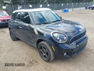 2012 MINI Countryman S z VIN WMWZC5C59CWM12757, wystawiony jako IAAI lot #42276546 z przebiegiem 159 772 mil mil oraz . Historia ofert i sprzedaży dostępna na DreamBid. Obrazek 1.