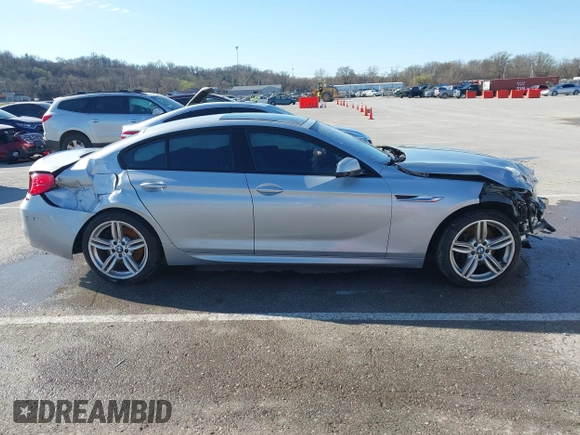 2015 BMW 6 Series 640i xDrive with VIN WBA6B8C52FD453433, listed as a IAAI auction lot 41805317 with 138,685 mi miles and . Bid and sale history available at carsss.com. Image 13.