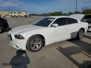 2013 Dodge Charger SXT Plus with VIN 2C3CDXHG3DH574433, listed as a Copart auction lot 50781235 with 217,138 mi miles and Salvage Title. Bid and sale history available at carsss.com. Image 1.