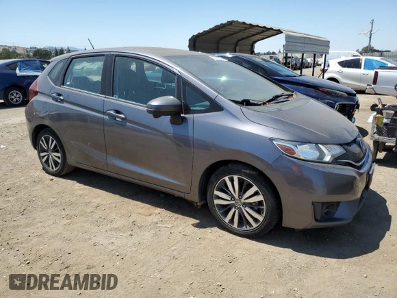 2015 Honda Fit EX-L with VIN 3HGGK5H83FM752900, listed as a Copart auction lot 62560045 with 217,574 mi miles and Clean title. Bid and sale history available at DreamBid. Image 4.