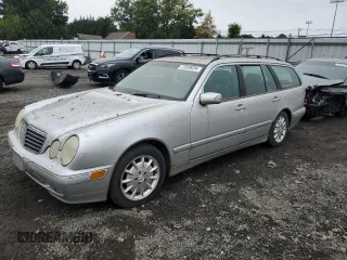 2000 Mercedes-Benz E-Class AWD with VIN WDBJH82J6YX039226, listed as a Copart auction lot 72559034 with 213,680 mi miles and Clean Title. Bid and sale history available at carsss.com. Image 1.