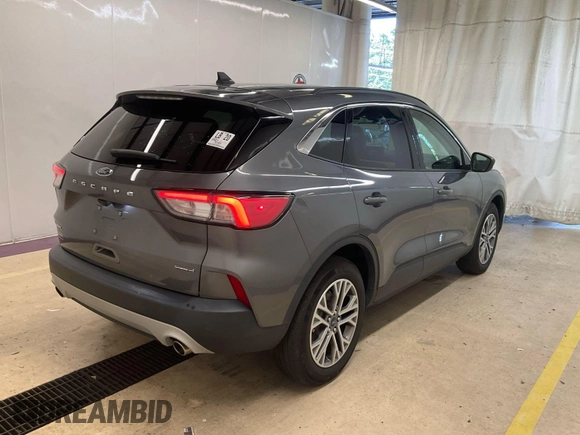 2021 Ford Escape SEL Hybrid z VIN 1FMCU9CZ7MUA83422, wystawiony jako IAAI lot #42743365 z przebiegiem 70 851 mil mil oraz . Historia ofert i sprzedaży dostępna na DreamBid. Obrazek 10.