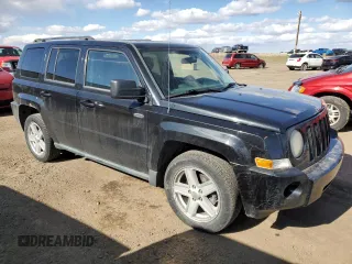 2010 Jeep Patriot Sport with VIN 1J4NF2GB8AD519311, listed as a Copart auction lot 53799085 with 203,762 mi miles and Salvage Title. Bid and sale history available at carsss.com. Image 4.