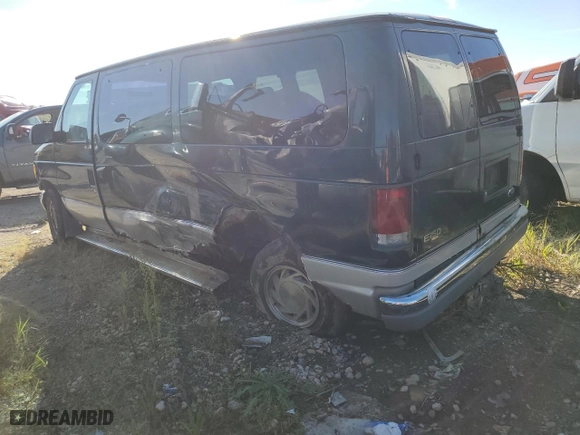 2000 Ford Econoline Wagon XL with VIN 1FMRE11L9YHB19715, listed as a Copart auction lot 69192734 with 237,129 mi miles and Salvage Title. Bid and sale history available at carsss.com. Image 2.
