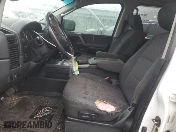 2010 Nissan Titan SE with VIN 1N6BA0ED7AN324632, listed as a Copart auction lot 57095185 with 156,391 mi miles and Salvage title. Bid and sale history available at DreamBid. Image 7.