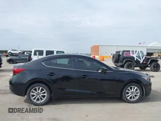 2014 Mazda 3 i Touring with VIN 3MZBM1V71EM100893, listed as a IAAI auction lot 41730726 with 59,596 mi miles and . Bid and sale history available at DreamBid. Image 13.